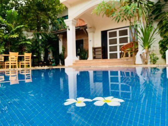 Ravoeun Angkor Boutique Hotel Siem Reap Bagian luar foto